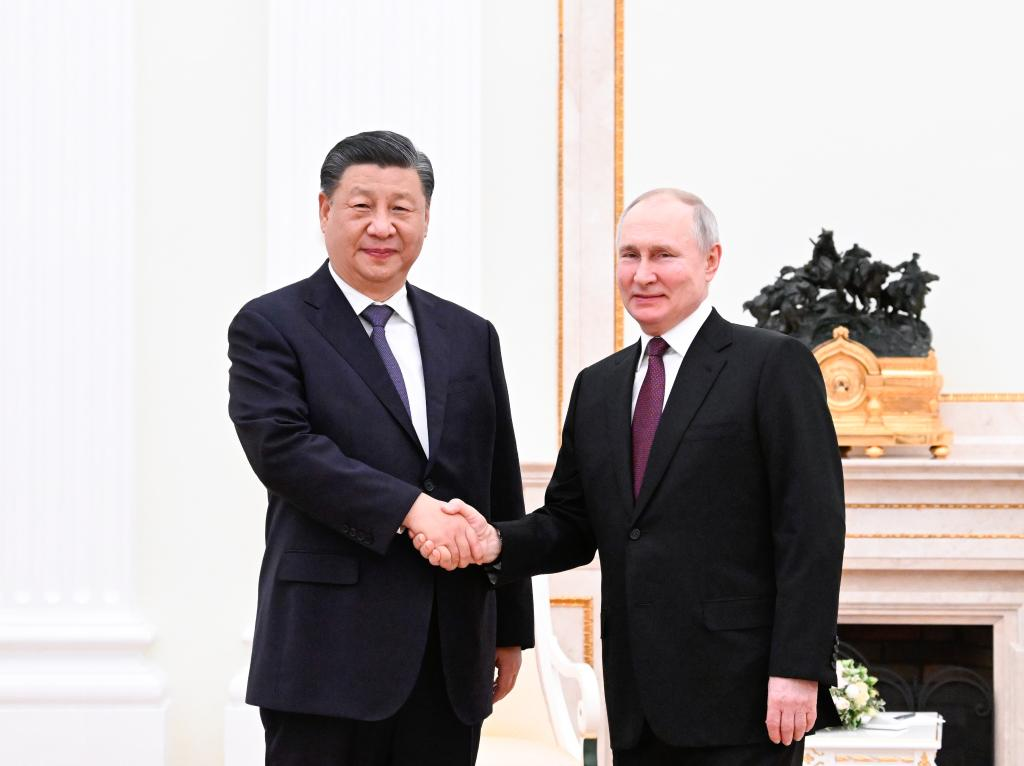 Le Président de la Russie, Valdimir Poutine en compagnie de son homologue chinois, Xi Jinping